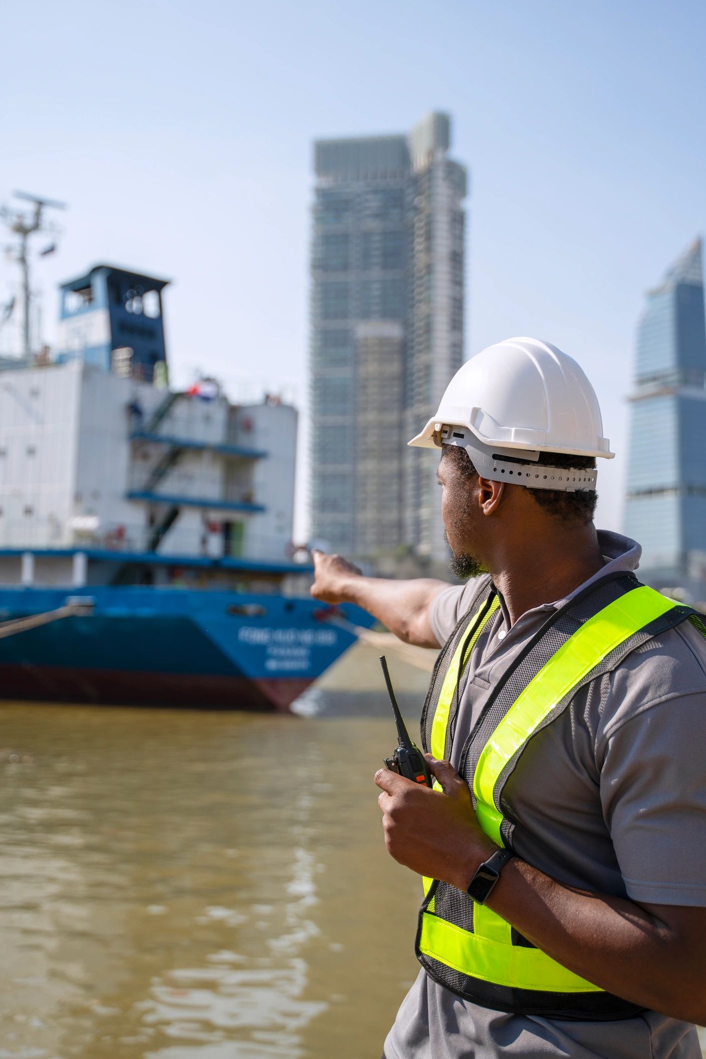 Boat professional standing at a marina